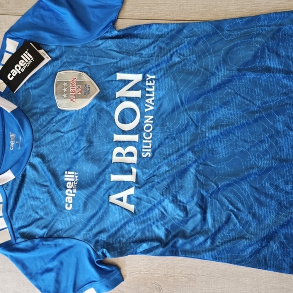 Capelli of  Red and Blue Fitted  Jersey. Brand new never worn number 23.